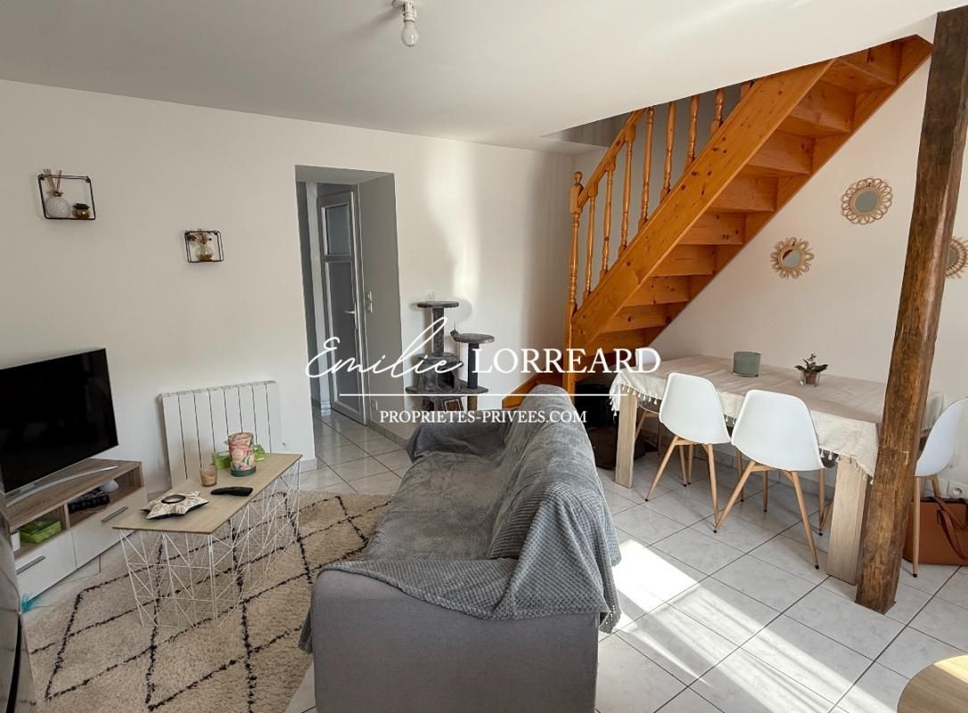 Immeuble composé de 2 logements : type T2  et T3