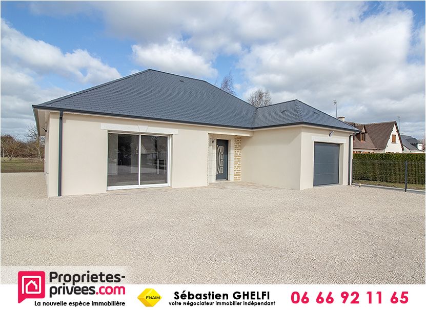 maison de plain-pied à pieds des commerces avec 3 chambres et garage