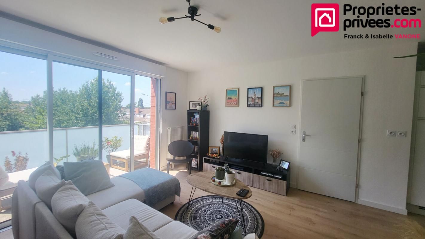 Appartement T2 - 48.02 m² - balcon - place de parking