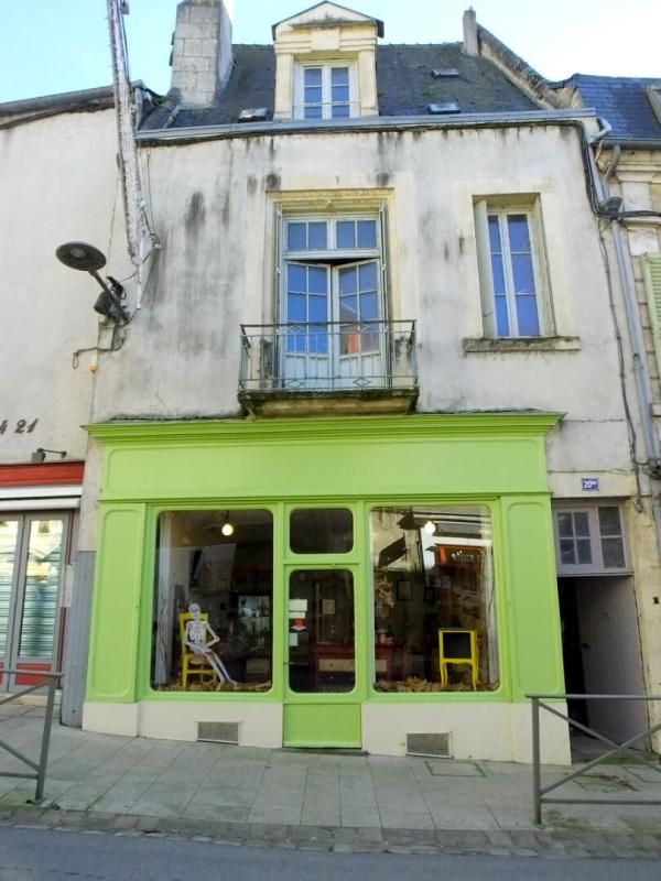 immeuble 3 appartements + local commercial (actuellement loué)