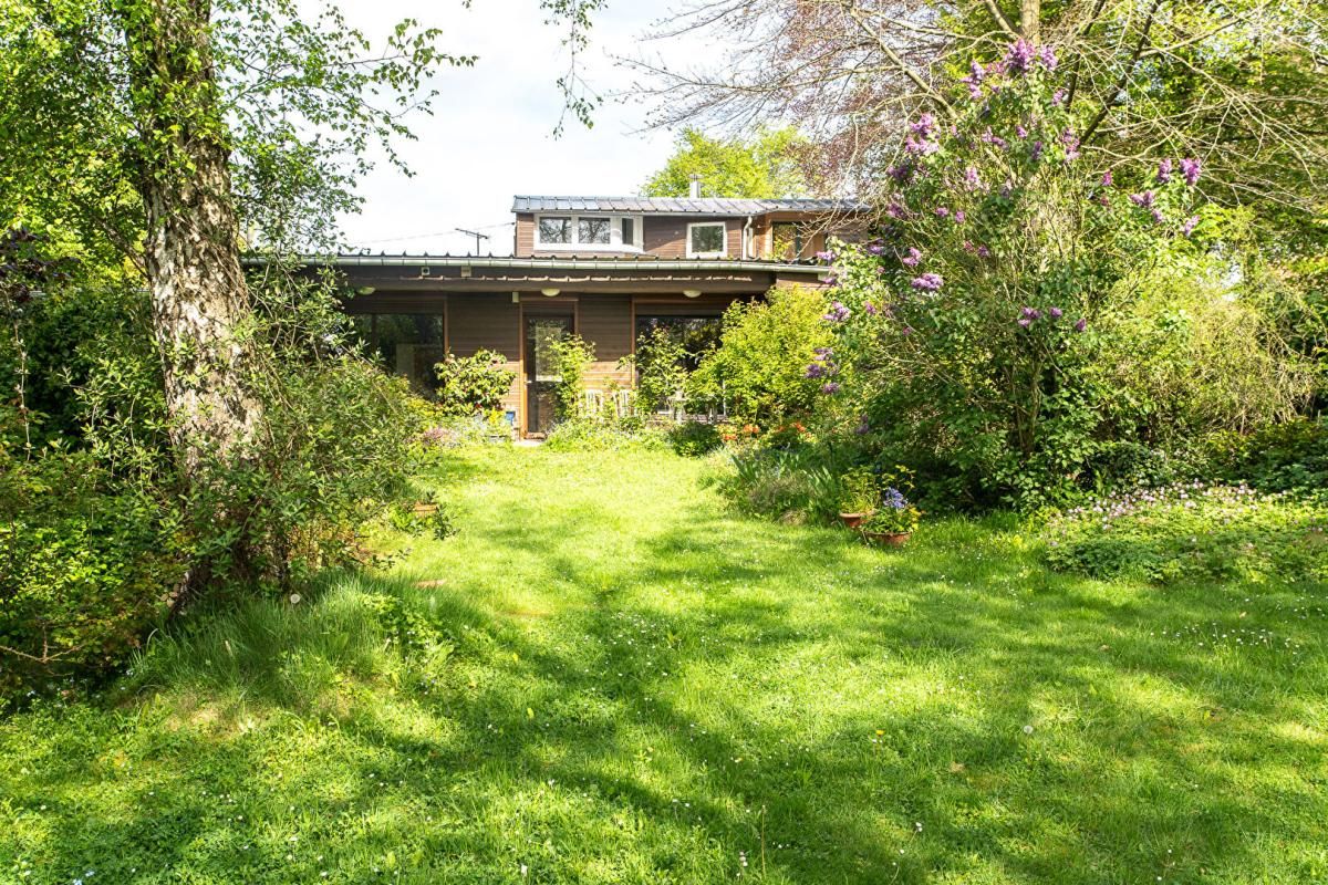 Maison en ossature bois - volumes généreux, jardin d'hiver et potentiel unique à Yvetot