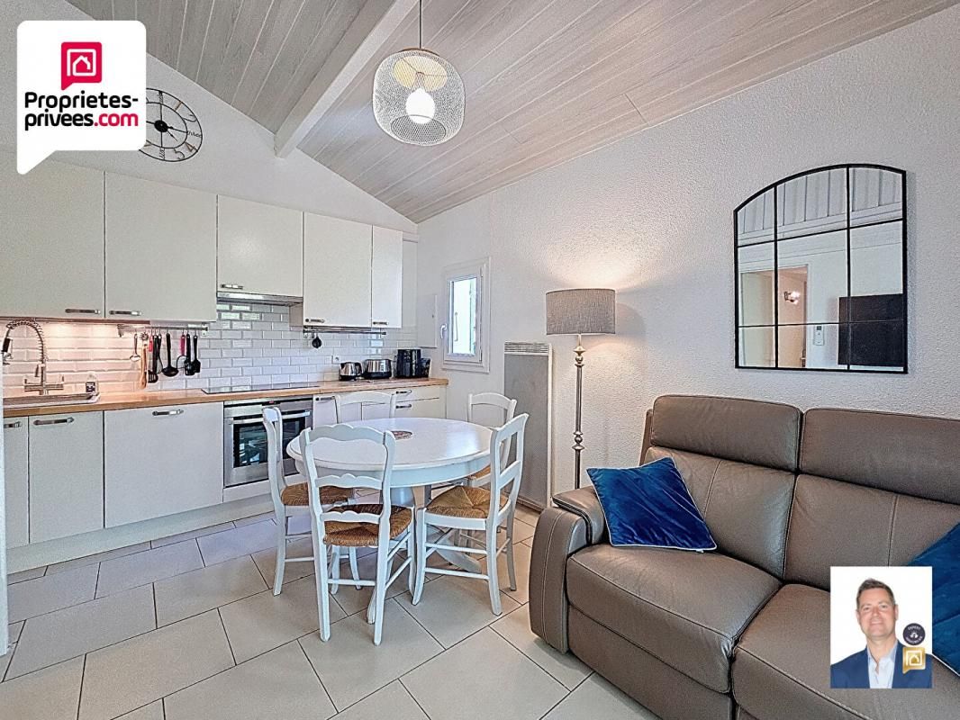 Maison 3 pièces 31 m2 avec terrasse couverte, jardin et place de parking