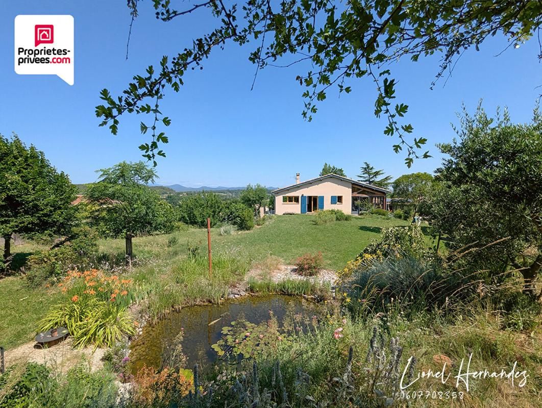 Maison d'architecte avec terrain constructible et paysagé de 3969m²