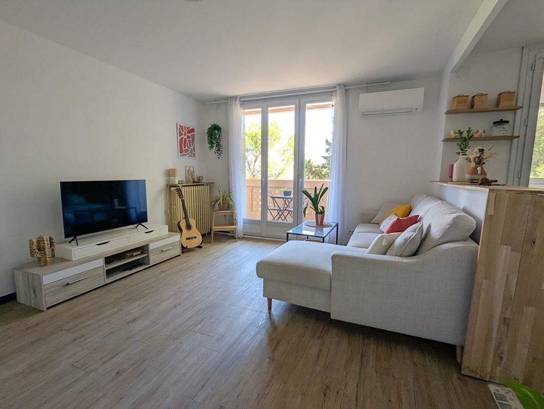 Appartement T4 - 67.52m² - 3 chambres - climatisation - balcon - loggia - garage - cave