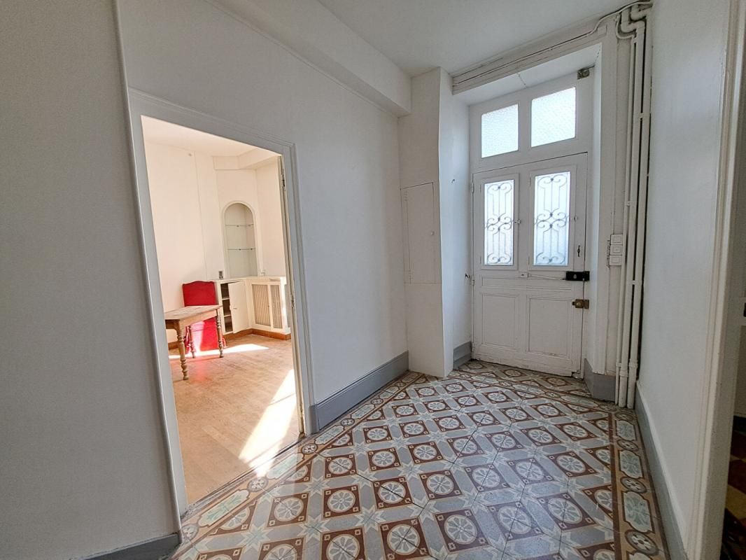 Maison de ville de charme,  en hyper centre, au calme