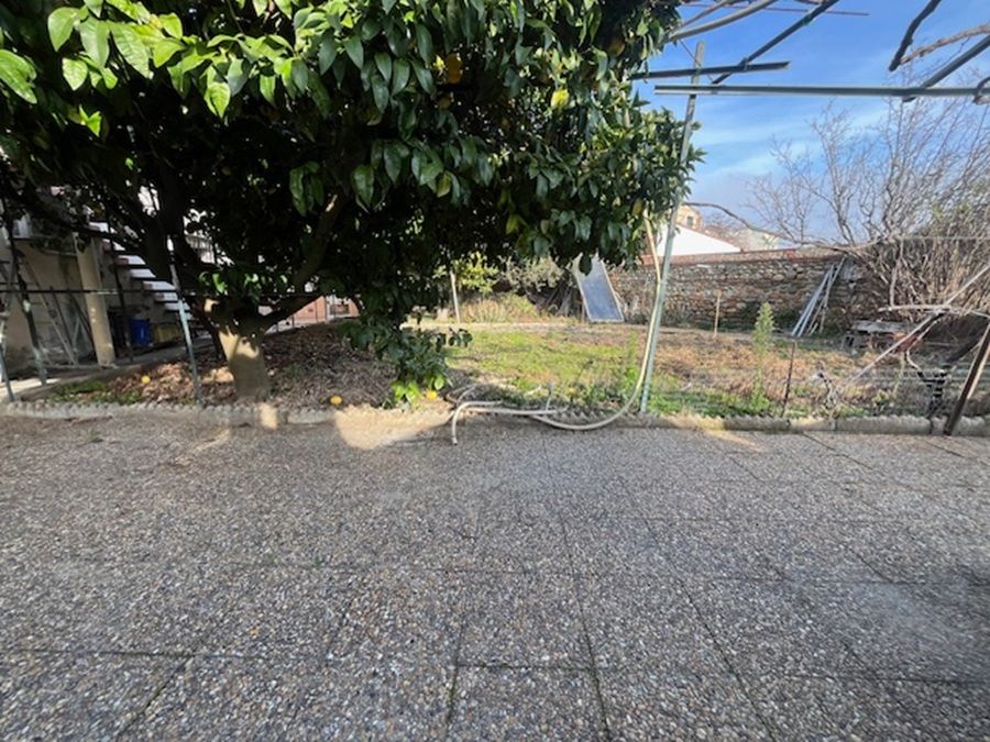 Charmante maison familiale de 230 m² avec double garage et jardin sur un terrain deux faces