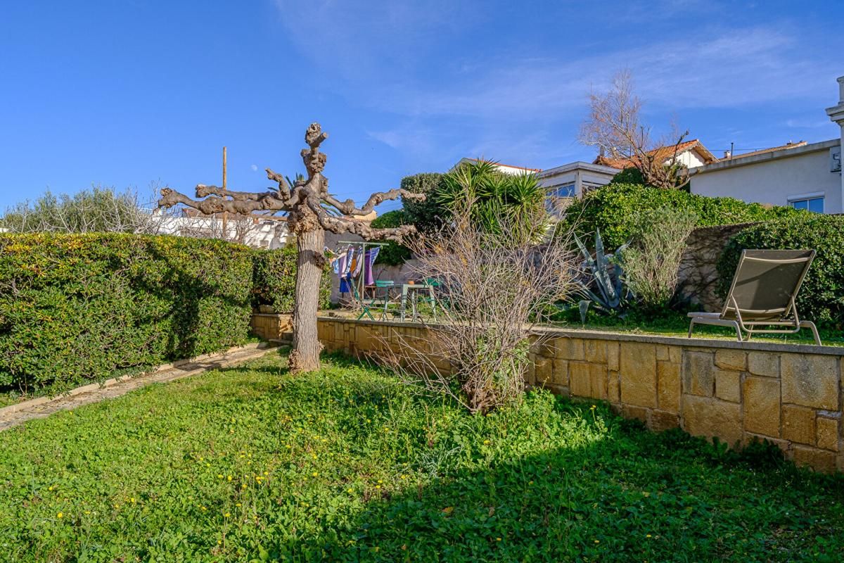 Appartement 4 pièce(s) 118 m2 vue mer, jardin partagé, box de garage