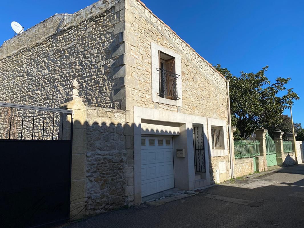Jonquieres Saint Vincent maison en pierre 114m² avec terrasse et garage