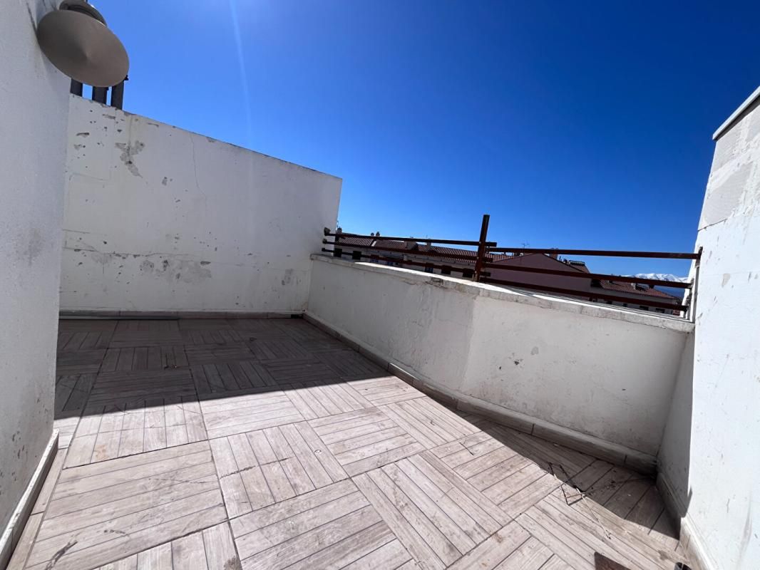 Charmant appartement de type loft au dernier étage d'une résidence de standing avec petite terrasse
