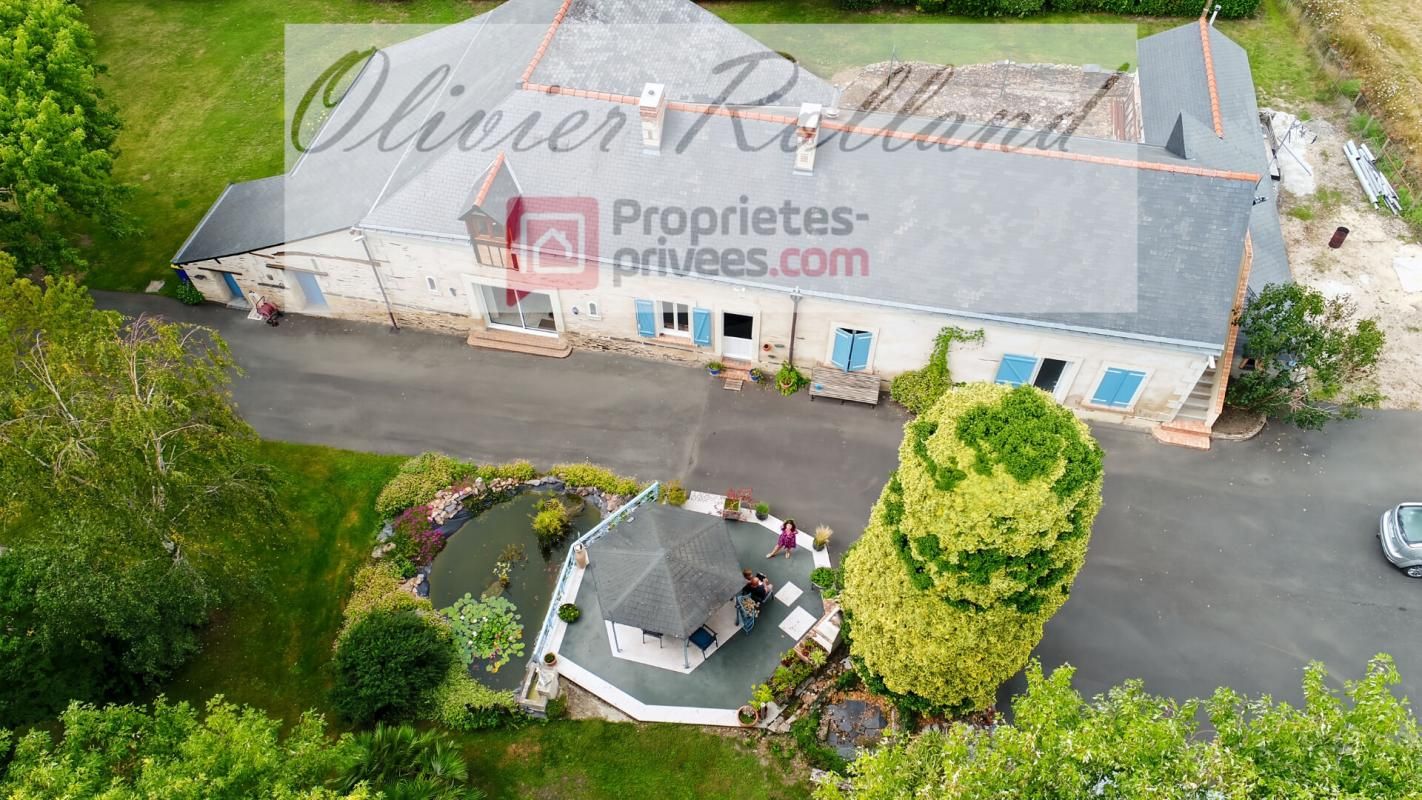 Magnifique longère rénovée avec goût au coeur d'un superbe parc