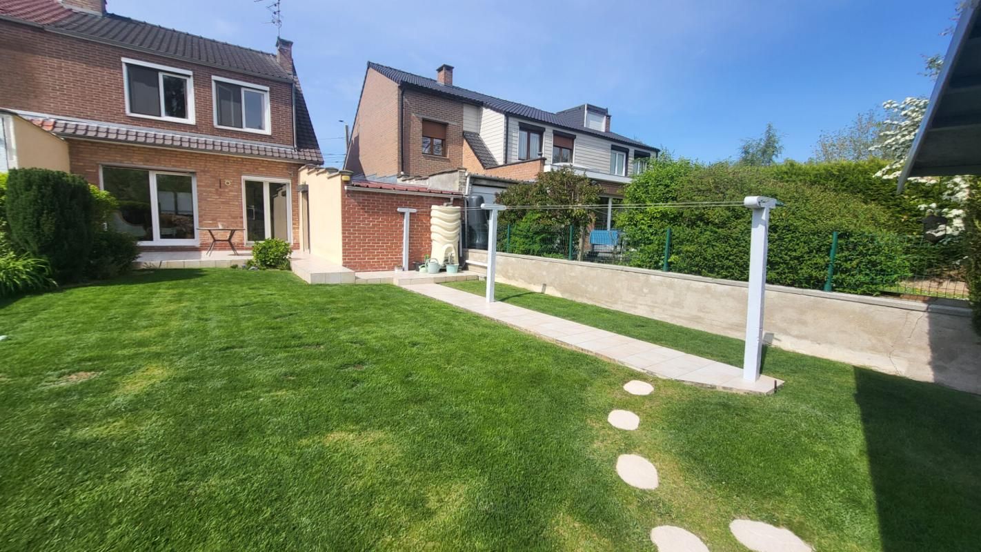 Traditionnelle - 3 chambres - garage - jardin - 98 m²