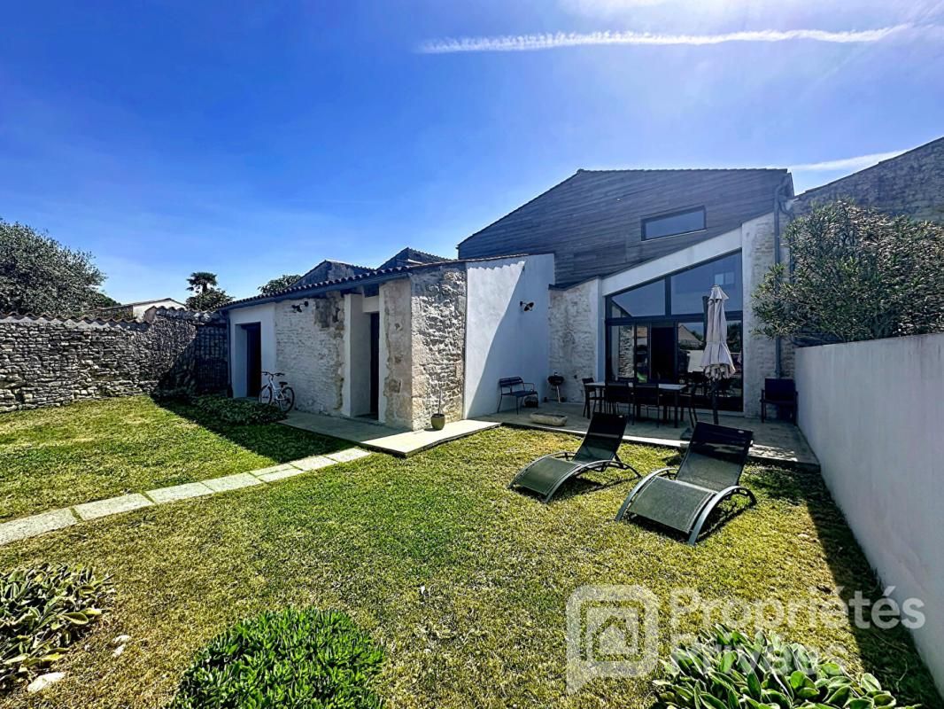 Maison de caractère pierres et bois 145 m²