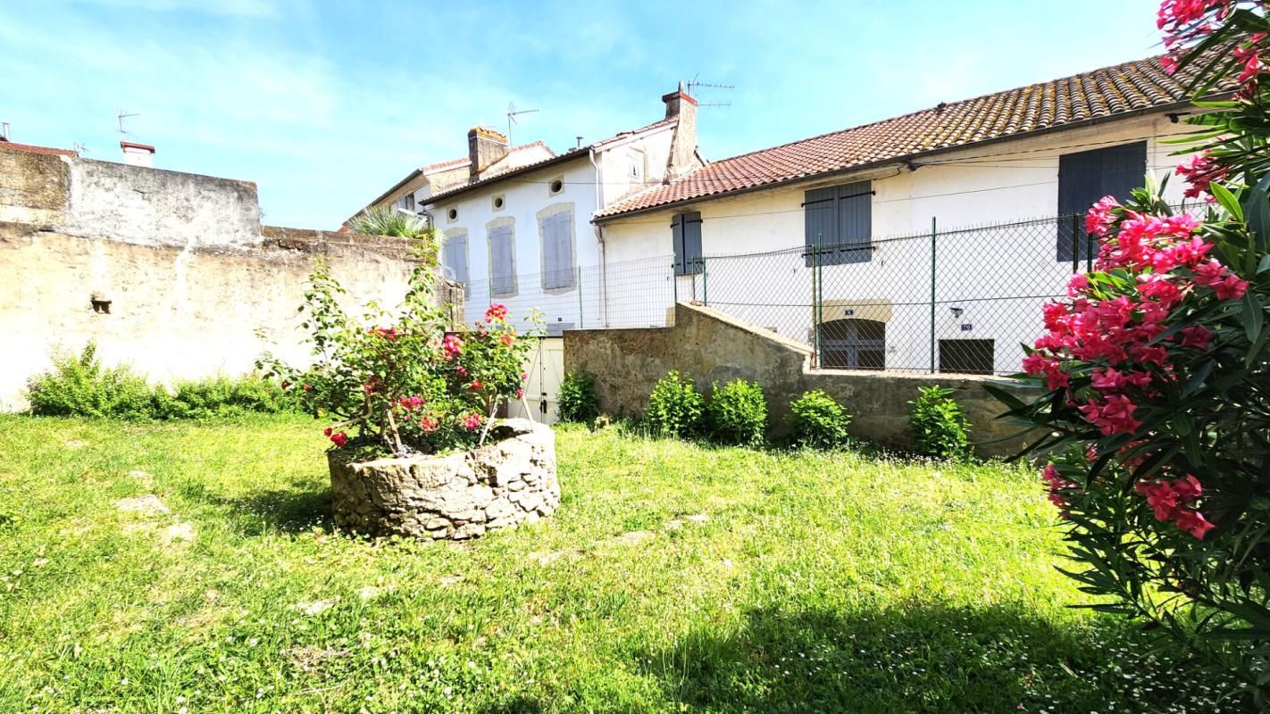 Maison de ville 170 m² - 3 chambres - Jardin - Garage