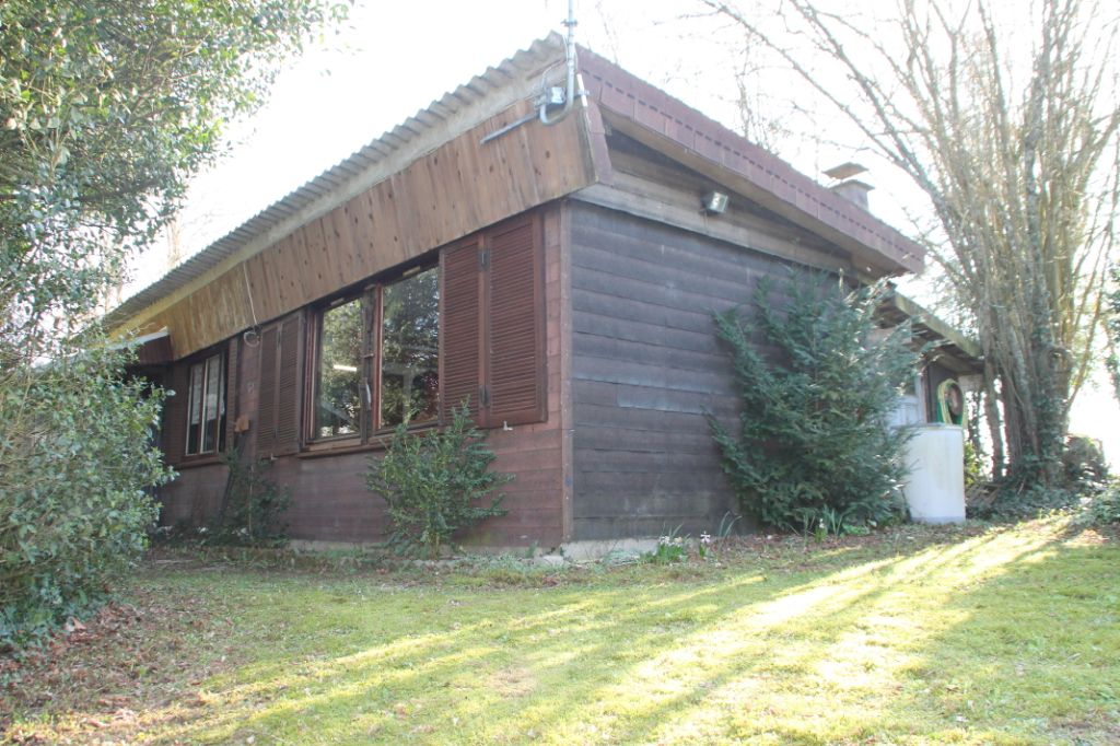 Châlet bois avec jardin arboré