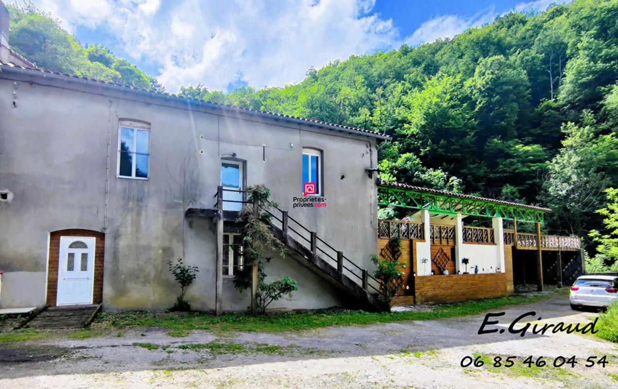 MAZAMET Maison en pierre de type T4 , avec terrasse en Pilotis, jardin, parking couvert, grande salle 2