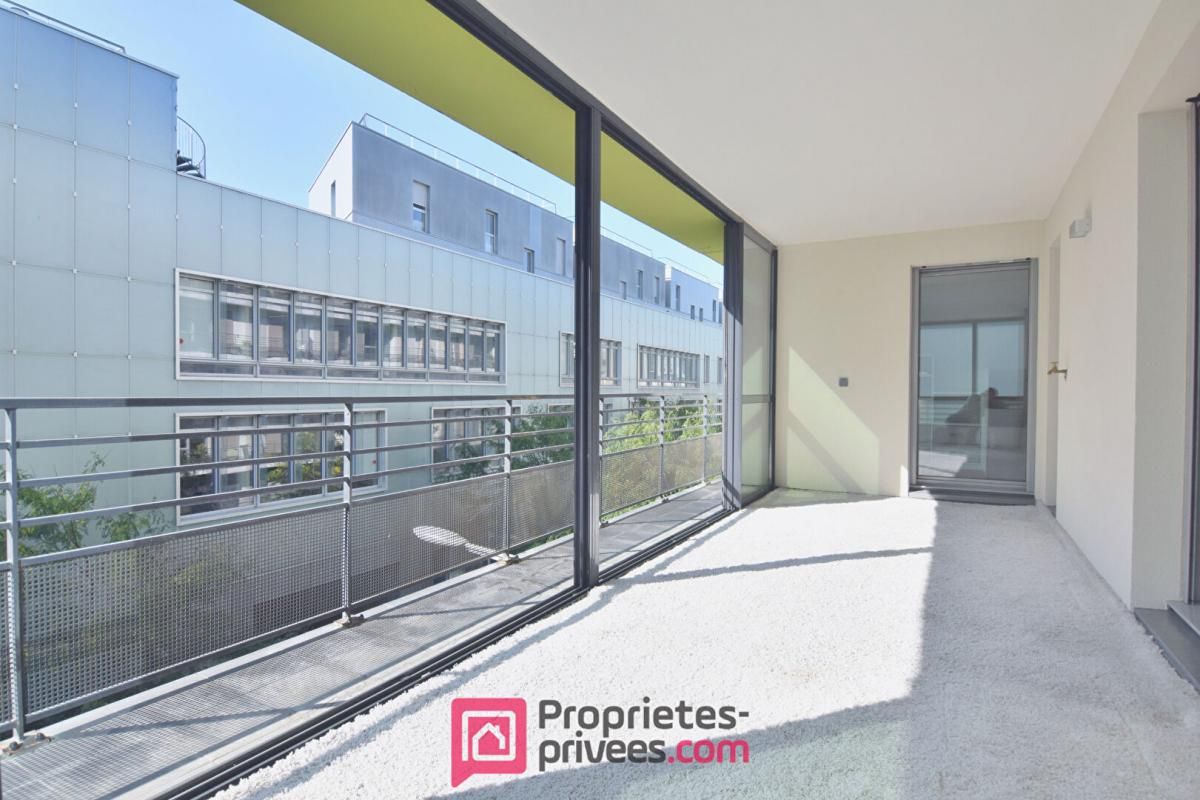 Appartement  3 pièces 66,03 m² Carrez  avec 18 m² de jardin d'hiver et 8 m² de balcon filant