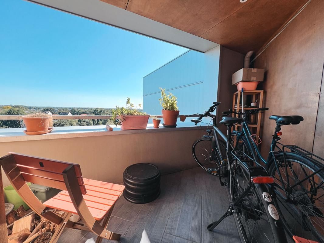 Appartement Nantes 2 chambres, garage et emplacement vélo - Vue sur le parc de la Bottière-Chenaie