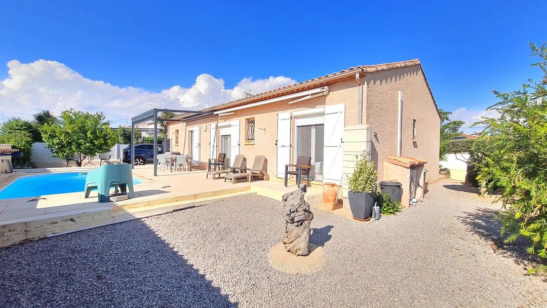 MAGALAS Jolie villa avec garage/piscine et vue sur le village sur 501 m² de terrain 2