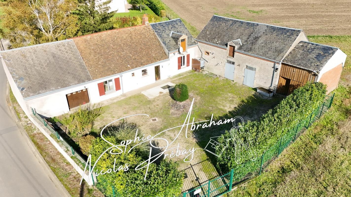 Ancien corps de ferme avec dépendances et terrain