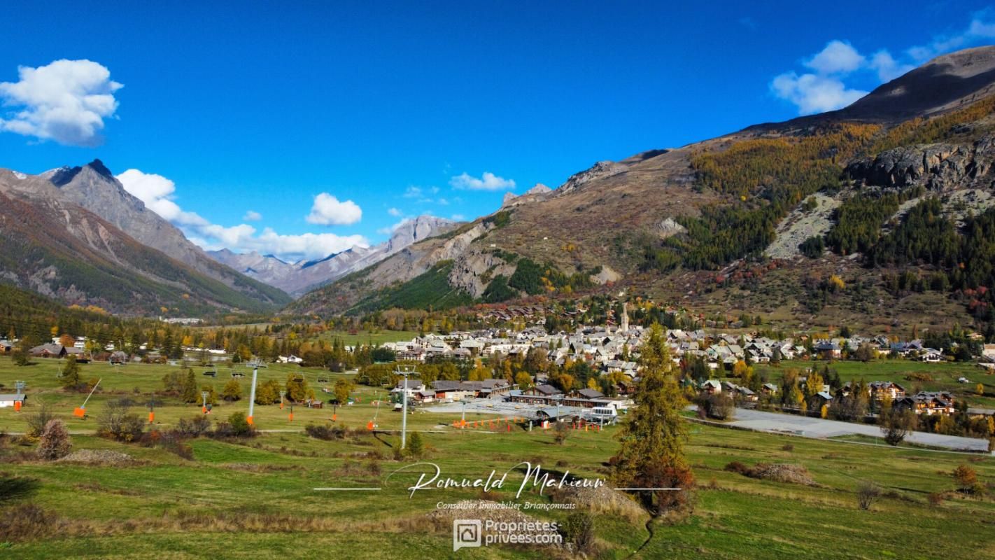 Le Monétier Les Bains -- Terrain plat à bâtir de 1000 m² - Situation Exceptionnelle