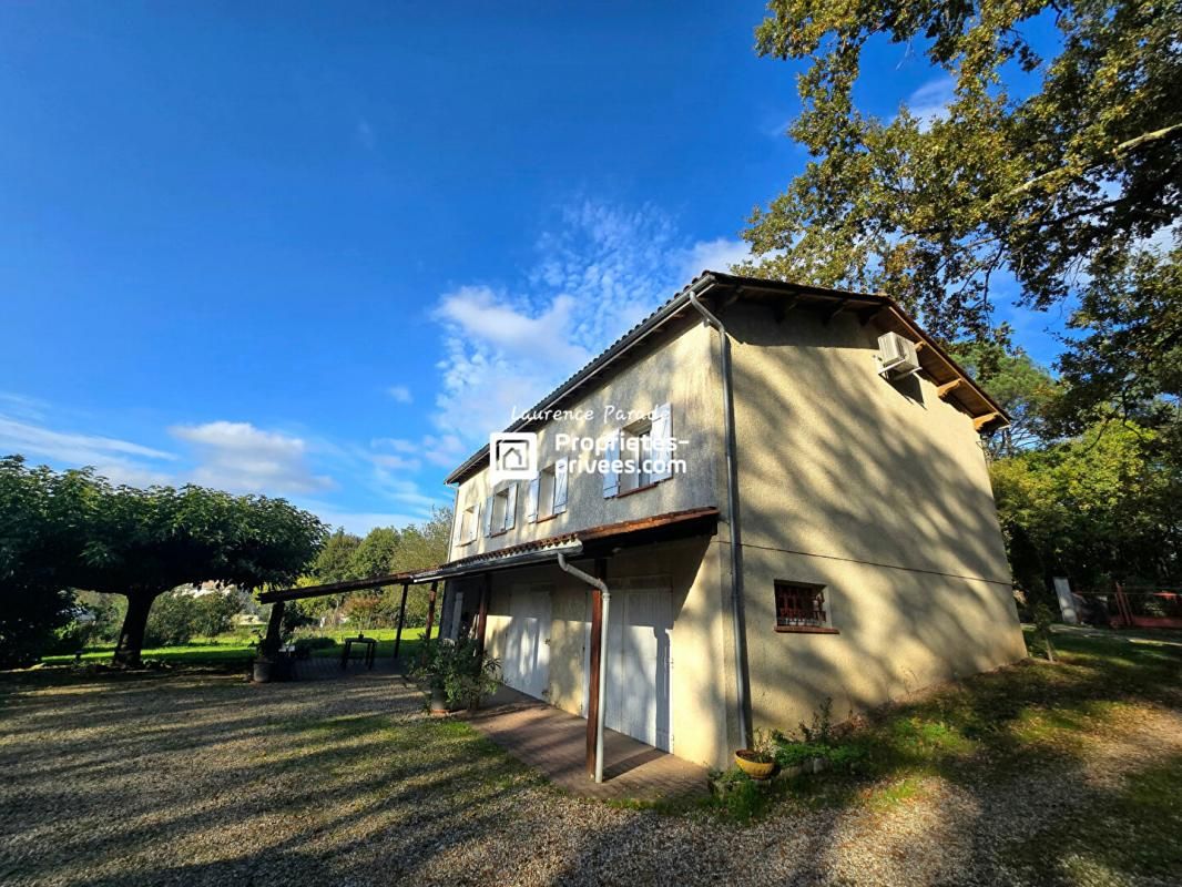 SAINT-SEURIN-SUR-L'ISLE Maison avec sous sol semi enterre garage double 1