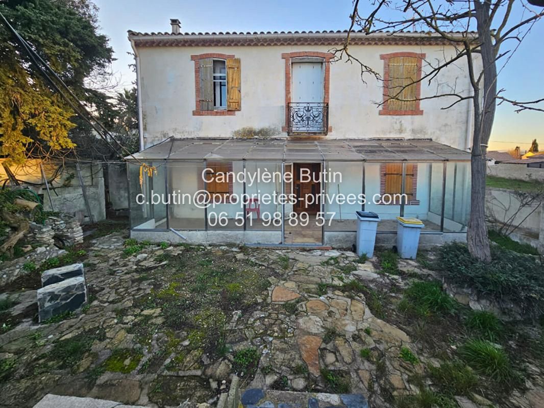 Maison à rénover,  avec 2 garages sur grand parcelle