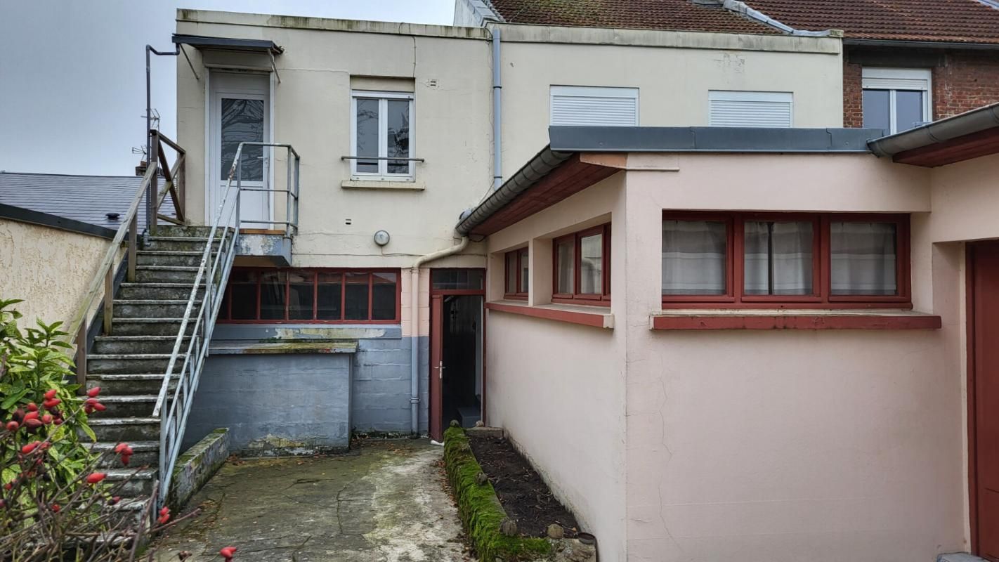 MAISON QUARTIER REMICOURT  A RENOVER AVEC GARAGE ET JARDIN