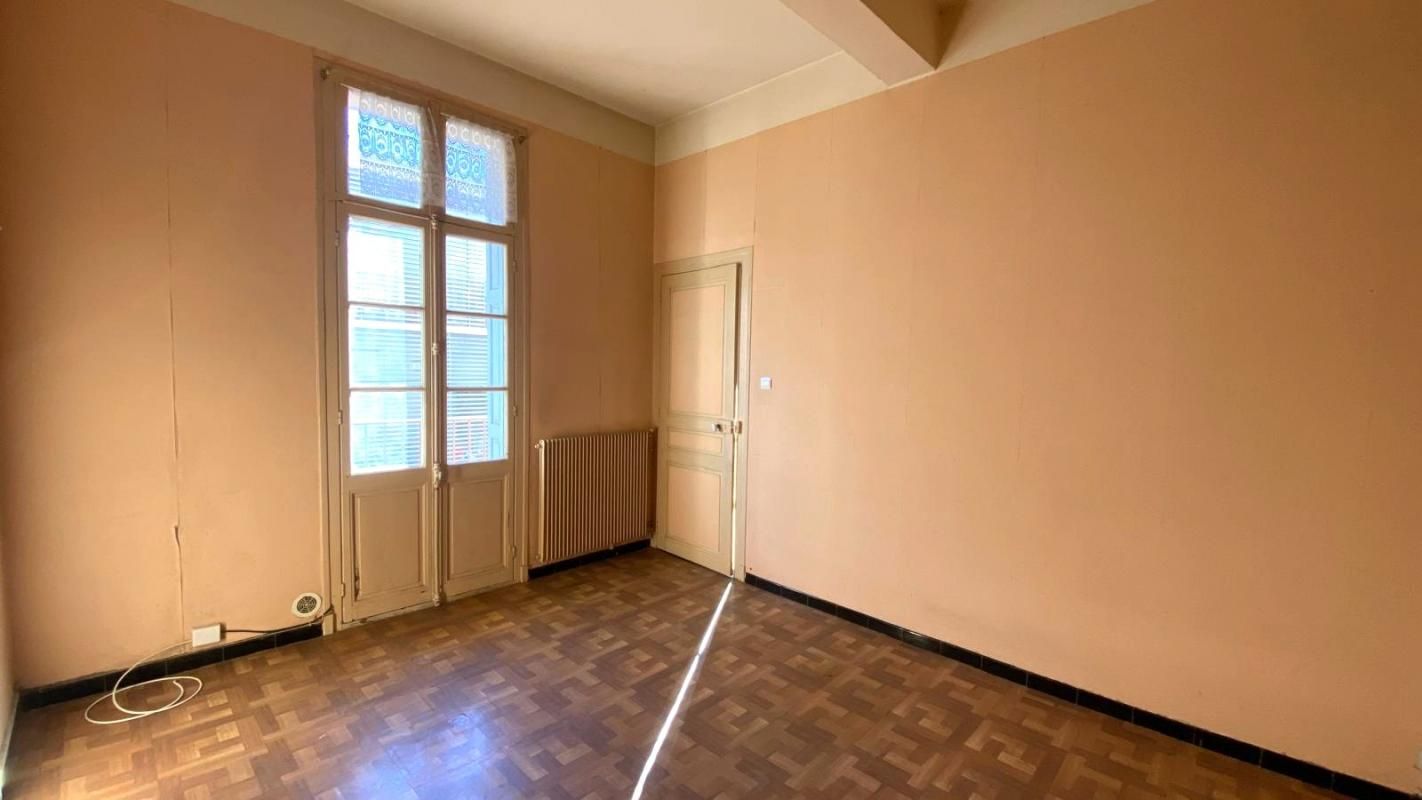 À VENDRE - Appartement 60 m² en rez-de-chaussée avec terrasse