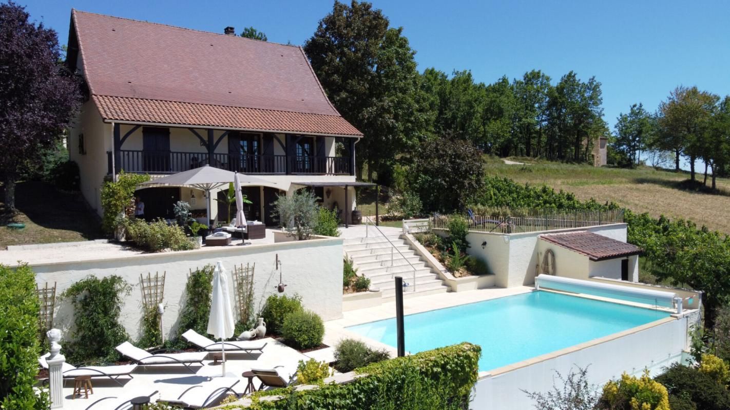 SAINT-CHAMASSY Maison avec 5 chambres et une piscine à débordement 1