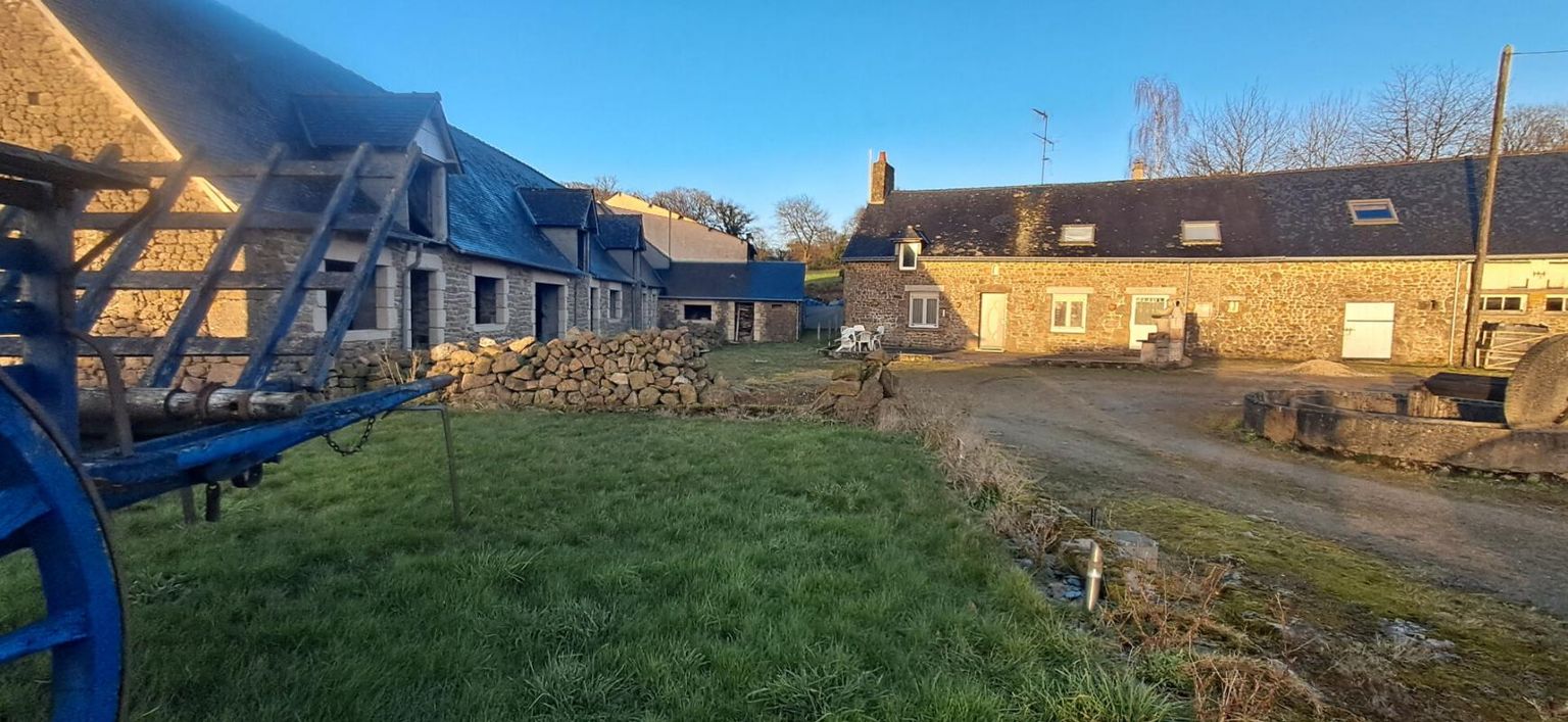 CHAMPEON SITE DE CAMPAGNE avec bâtiments d'habitations en pierres à fort potentiel 1