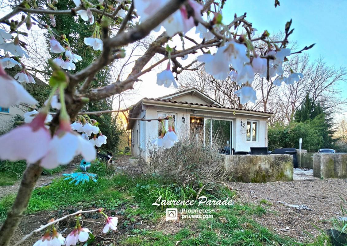 Maison avec garage et parc