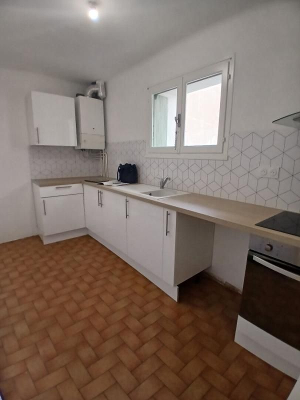 Vente appartement trois pièces en 1er étage/2 coeur de ville de Béziers
