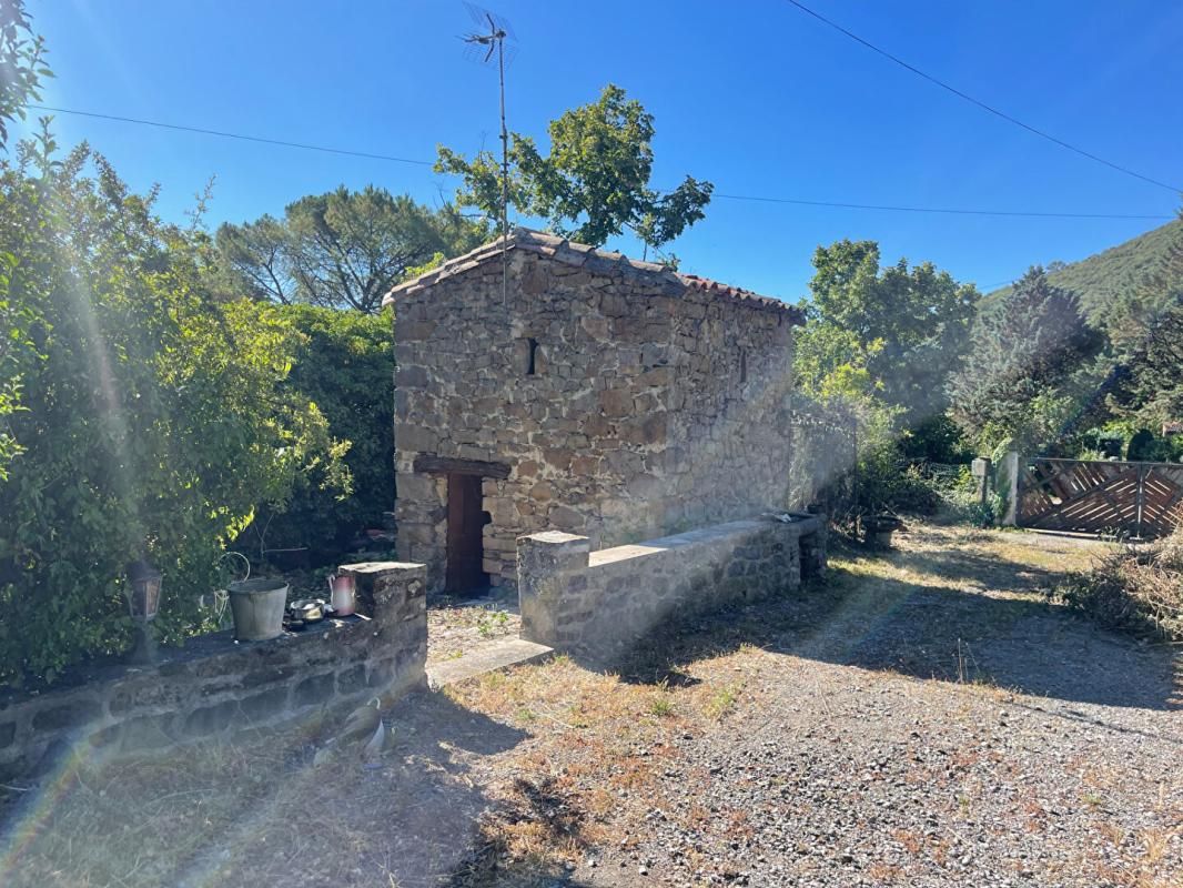 ANDUZE Mas en pierres mitoyen proche Anduze sur terrain constructible de 3300 m2 4