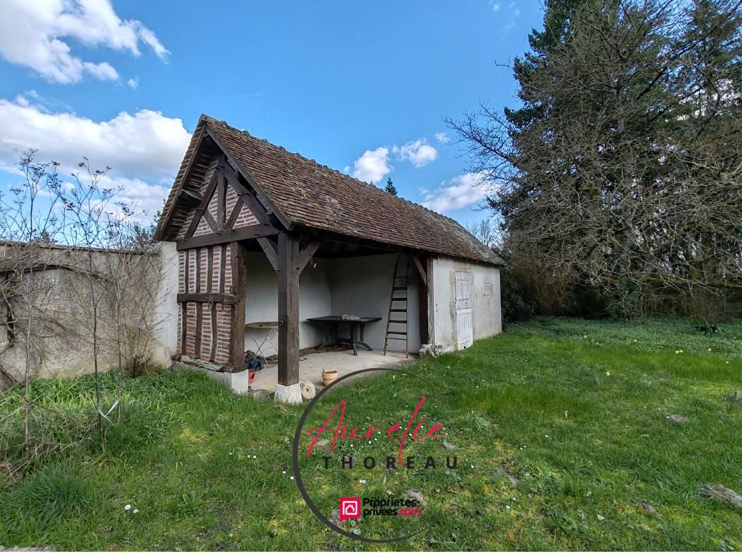 Longère sur terrain arboré